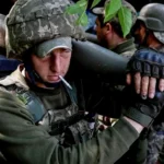 Rusia Diduga Lakukan Eksekusi Tentara Ukraina Pedang Bertulis untuk Kursk Tertancap di Dada